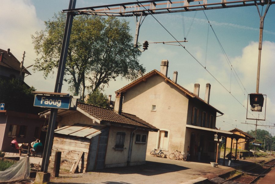 Faoug station building and goods shed, railway side